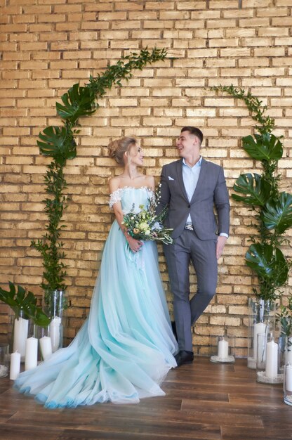 Newly married couple, loving couple before the wedding. Man and woman loving each other.