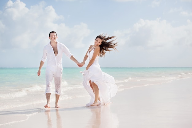 Newlywed couple on a tropical beach