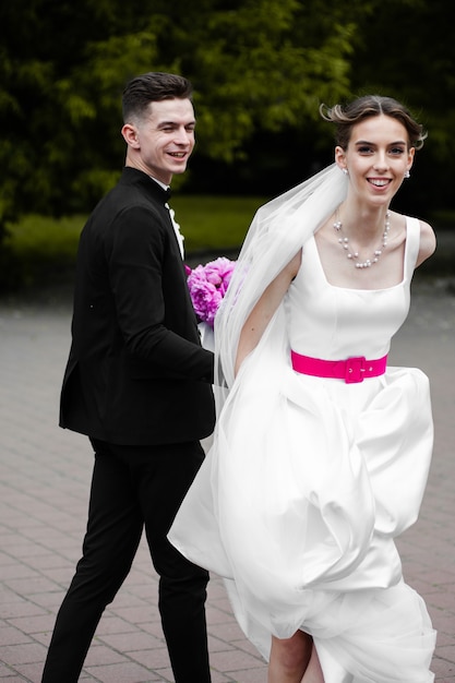 Newlywed kissing and hugs Wedding day