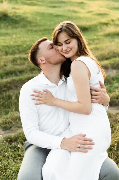 romantic young couple sitting in garden 20640476 Stock Photo at Vecteezy