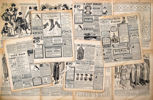 newspaper pages with antique advertising