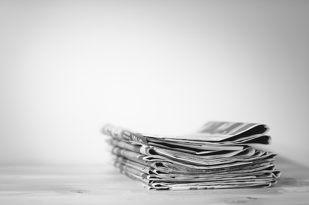 Newspaper on wooden table