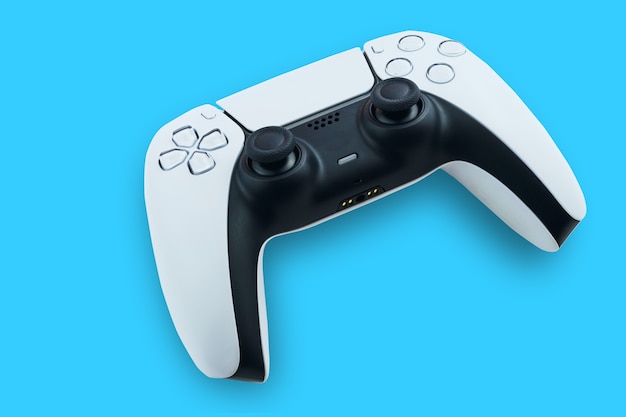 Фото Белый игровой контроллер нового поколения на синем фоне. вид сверху.
