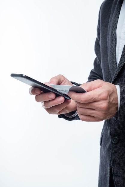 Nfc mobile payment man holding credit card and phone