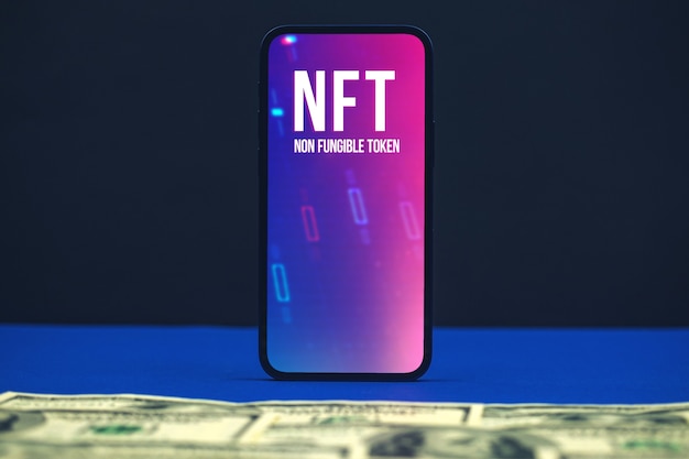 Nft niet-verwisselbare token, achtergrond van innovatietechnologie, logo op de schermfoto