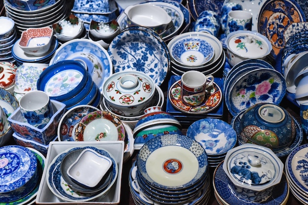 Nha Trang, Khanh Hoa - September 8, 2022 Many colorful plates and cups in vietnamese market