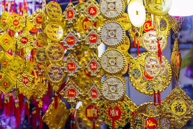 Nha Trang Vietnam 13 January 2023 many decorations as symbol of wealth in the market for Tet Luna