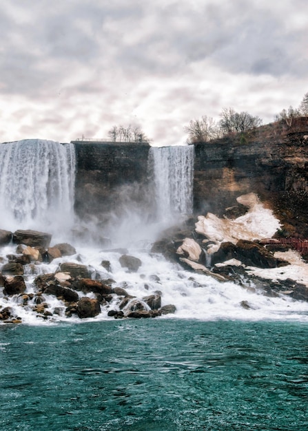 Niagara Falls, America. A view on American Falls and Bridal Veil Falls. At early springime