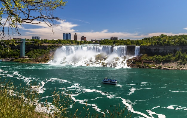 Niagara Falls Niagara river observation tower deck with tourist watefalls cruise boats city