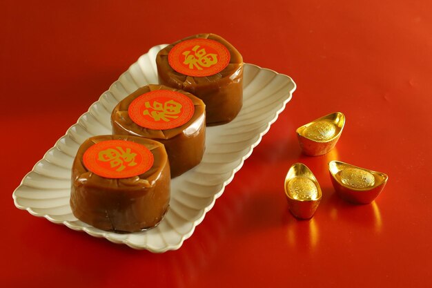 Nian gao または kue keranjang、中国の旧正月のケーキ (漢字で Fu は幸運を意味します)