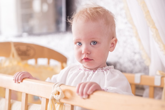 Nice infant looking at the camera. Adorable little toddler