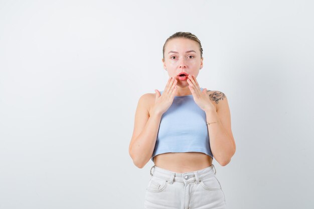 nice lady is showing surprised emotion on white background