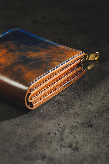 Nice leather wallet The skin is blue and brown Handmade expensive products A gift for men and women