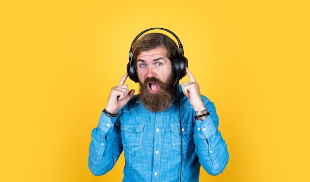 Nice sound ebook and elearning concept education online online business course his favorite song cheerful man wear modern earphones male in headphones listen music