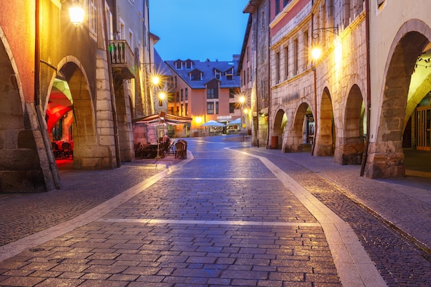 Nice street rue sainteclaire in old town of annecy at rainy night france