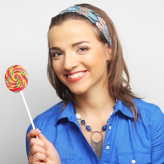 Nice young girl with lolipop