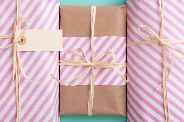 Photo nicely wrapped birthday christmas or any other celebration gifts presents in striped paper