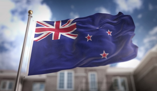 Nieuw-Zeelandse Vlag Vlag 3D-rendering op de blauwe hemel gebouw achtergrond