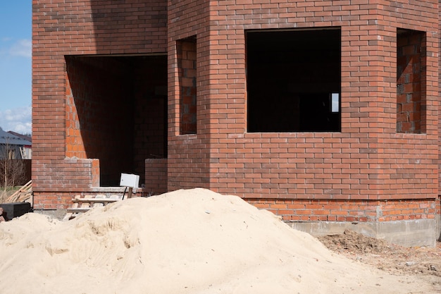 Foto nieuwe bakstenen huis bouwplaats