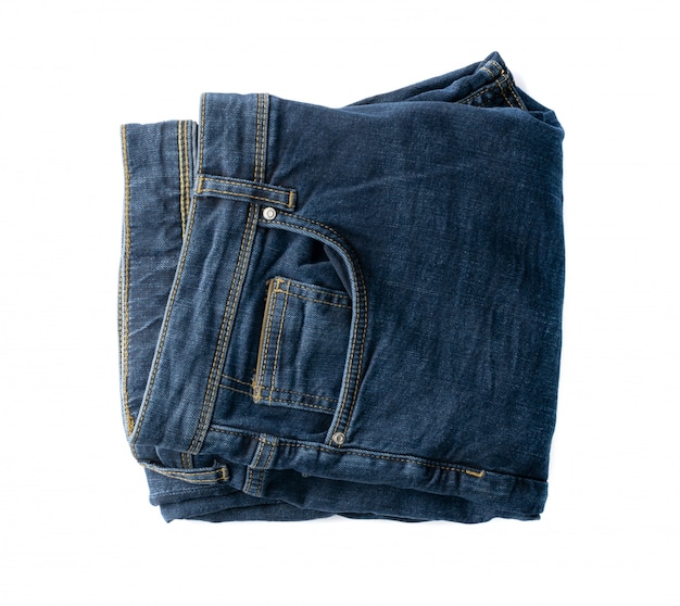 Nieuwe donkerblauwe jeans bovenaanzicht. Indigo denim broek geïsoleerd op een witte achtergrond