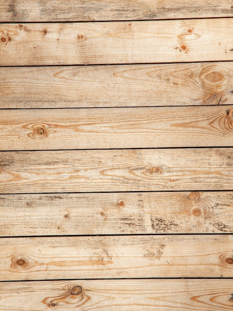 Foto nieuwjaars kerstachtergrond gemaakt van houten planken met dennentakken