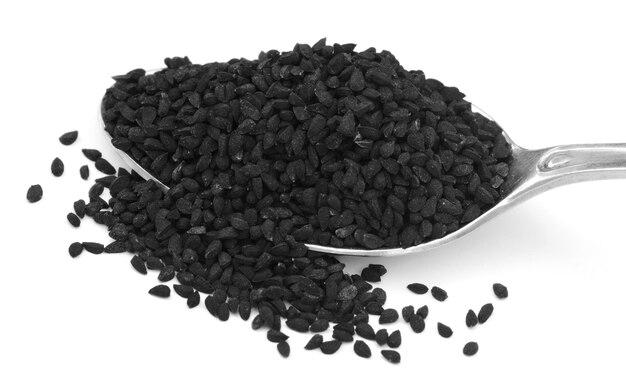 Nigella or Black cumin on a silver spoon