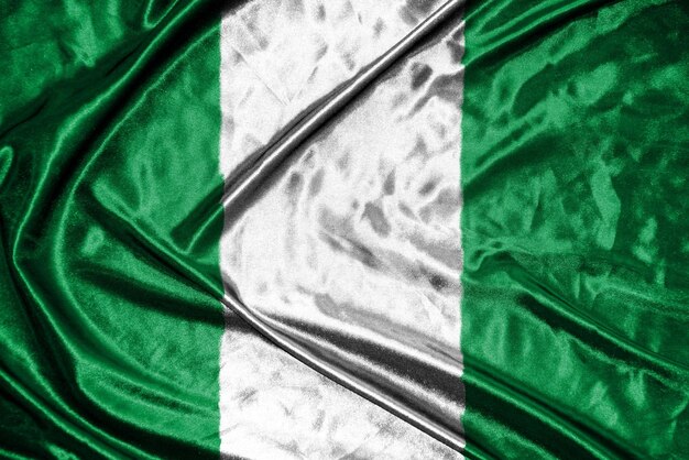 Photo nigeria cloth flag satin flag waving fabric texture of the flag