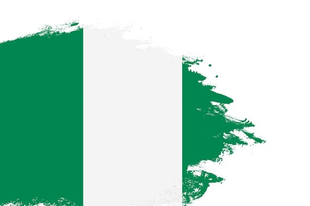 Nigeria flag on a stained stroke brush painted isolated white background with copy space