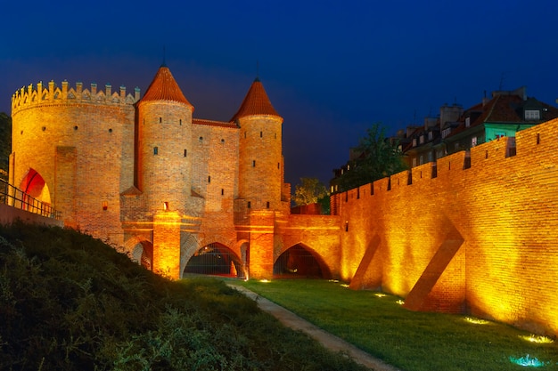 Night Barbican in the Old Town of Warsaw, Poland