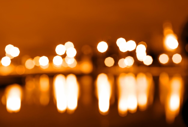 Bokeh di luci della città di notte con sfondo di riflessi hd