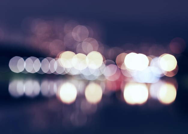 Night city lights bokeh with reflections background hd