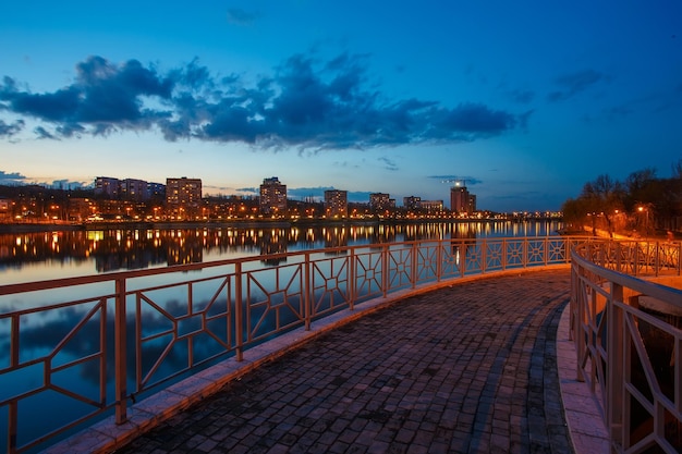 Night city reflection on the river