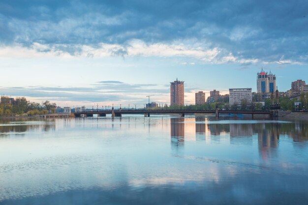 Night city reflection on the river