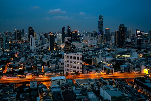 Night cityscape and high-rise buildings in metropolis city center