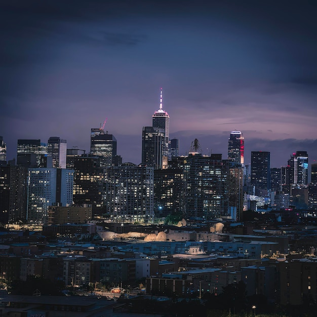 Night cityscape view againts sky