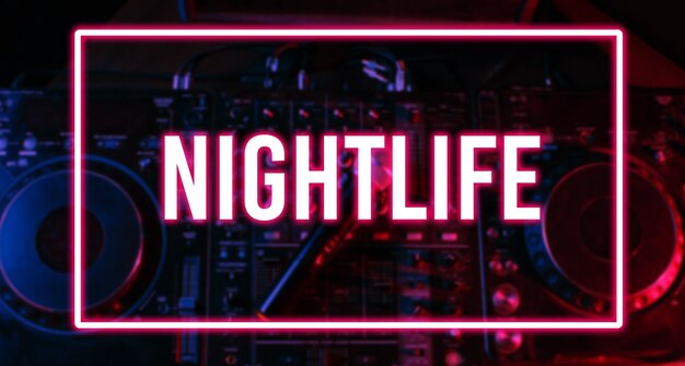 Night club, nightlife concept. Disco. Microphone on DJ remote. Neon red blue light