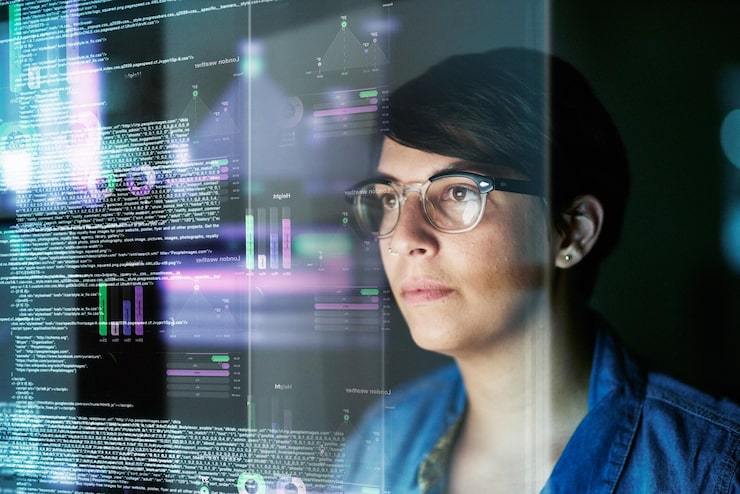 Photo night code and hologram with woman in office for programming future and software development big data networking and technology with female developer for cloud computing programmer and coding