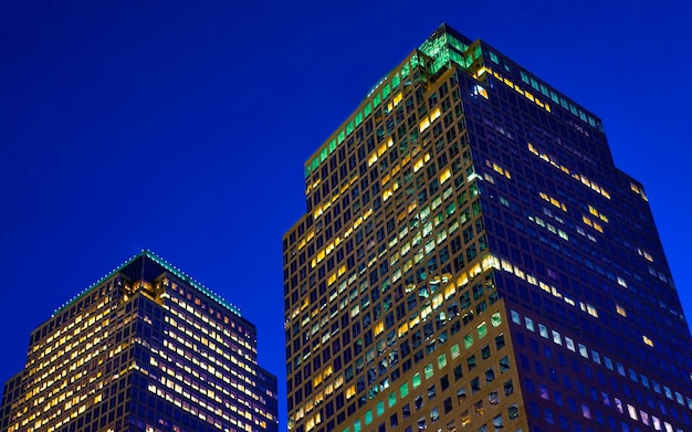 Night or evening view with Skyline with Skyscrapers in Financial Center Lower Manhattan, New York City, America. USA. American architecture building. Panorama of Metropolis NYC. Metropolitan Cityscape