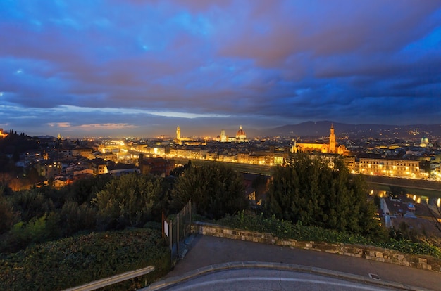 Night Florence City top view Italy, Tuscany on Arno river.