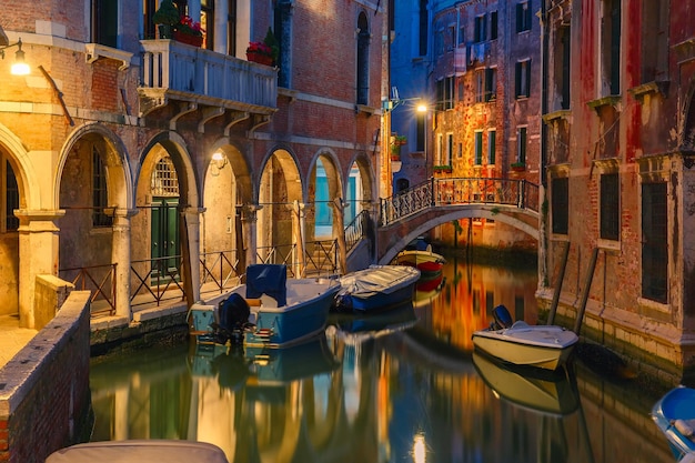 Night lateral canal and bridge in Venice Italy