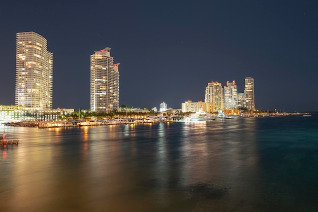 Night panoramic photo of miami landscape miami downtown behind macarthur causeway shot from venetian