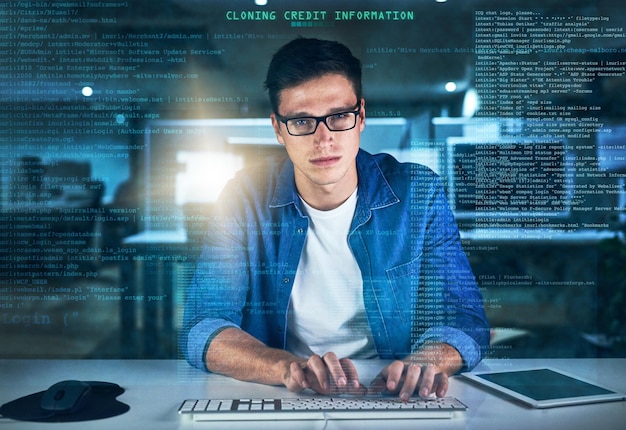 Night programmer and man in office typing and overlay of interface keyboard and software Dark dashboard and coder for agency information technology and ideas for programming of data in web