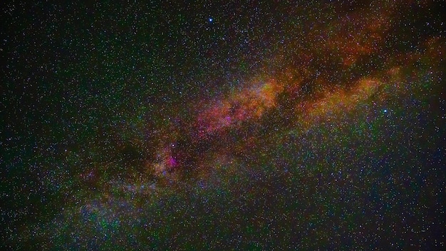 Night starry sky with shooting stars Perseid meteorites and comets on the background of the Milky Way Timelapse