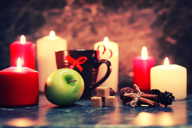 Night table with mug and candle