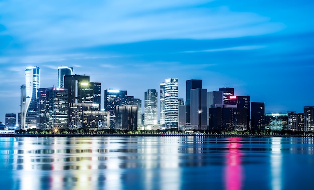 Night view of architectural landscape and urban skyline in Hangzhou Financial District

