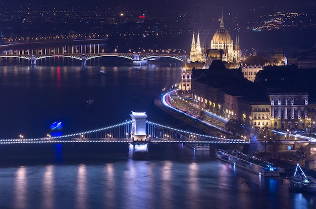 Night view of Budapest, building of The Hungarian Parliament and Chain Bridge, main landmarks in the city