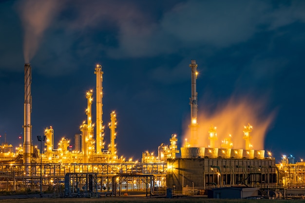 Night view over petroleum power plant industrial background