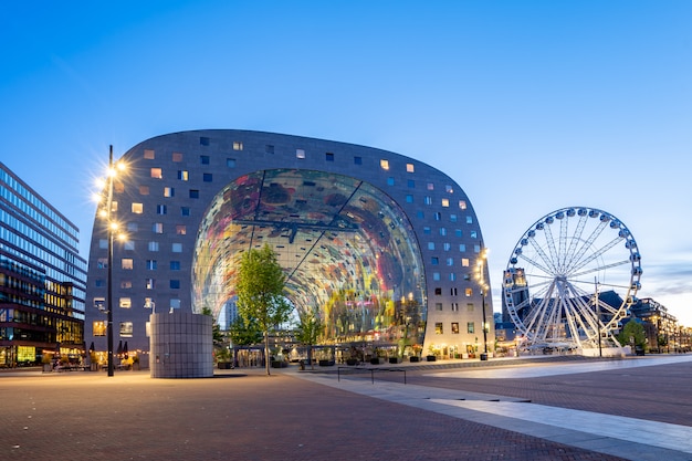 Night view of Rotterdam city with Markthal in Netherlands.