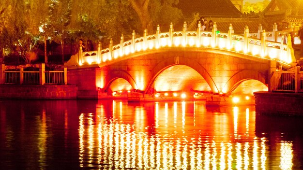 Night view with reflecting lights in the Baihai Lake, Beijing, China.