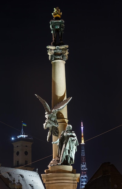 Night winter Adam Mickiewicz monument Lviv Ukraine